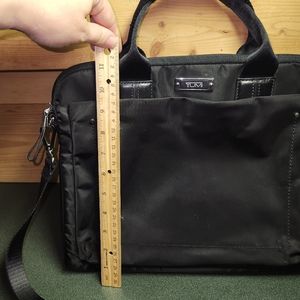 Tumi crossbody black bag in excellent  condition